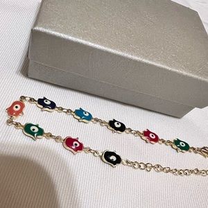 Super cute, evil eye bracelet, colorful, gold tone comes in a gift box